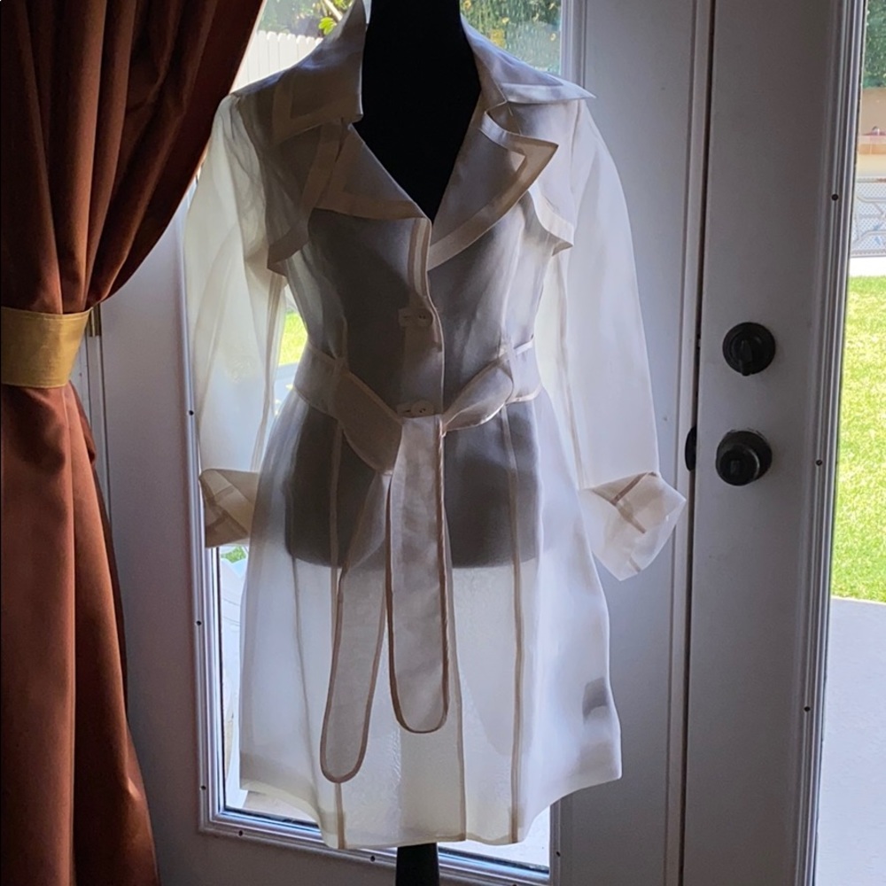 Bebe Sheer white size Sm . Trench coat